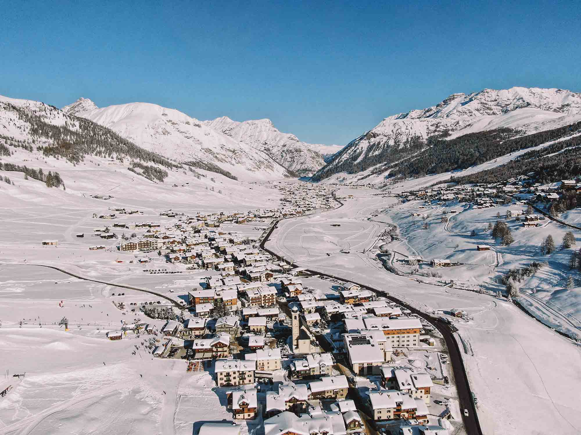 Aerial view of a snow-covered mountain village in Livigno