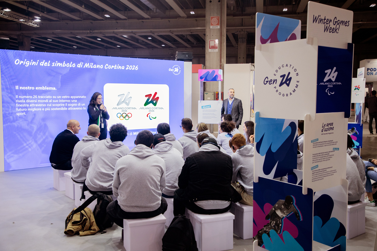 A group of young people attending a Job orienta- dual career presentation by Gen26 with Andrea Varnier, CEO of the Milan-Cortina 2026 Foundation