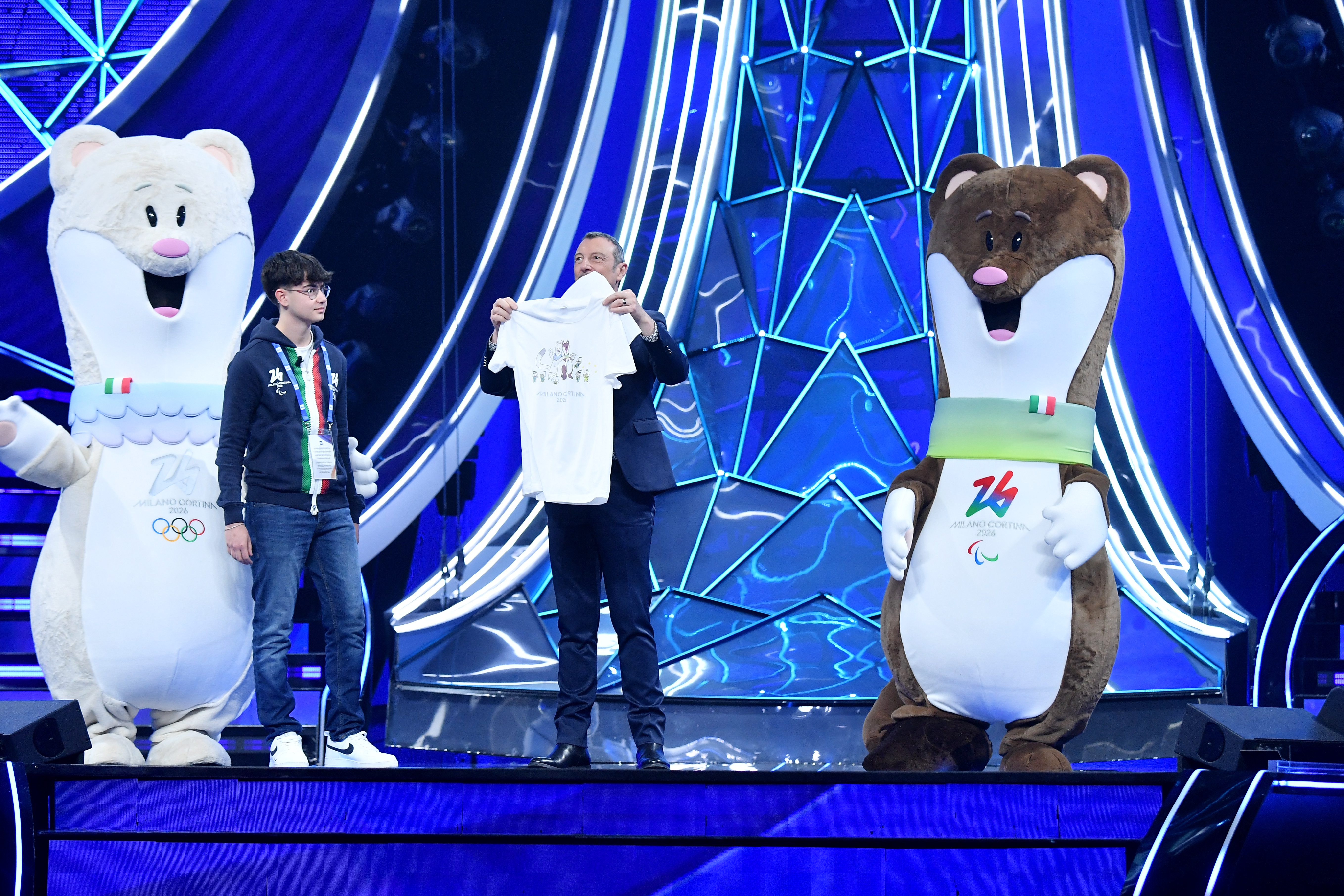 Photos of the Sanremo stage with the Mascots, Amadeus and the boy who drew the mascots