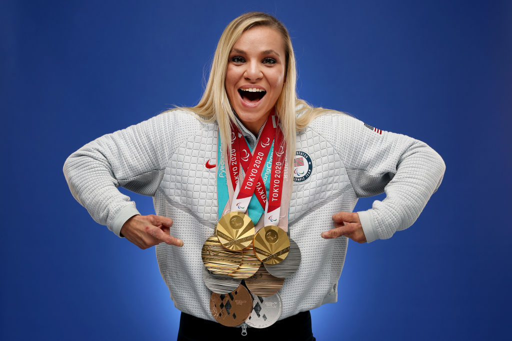 Photo of Oksana Masters with her medals around her neck