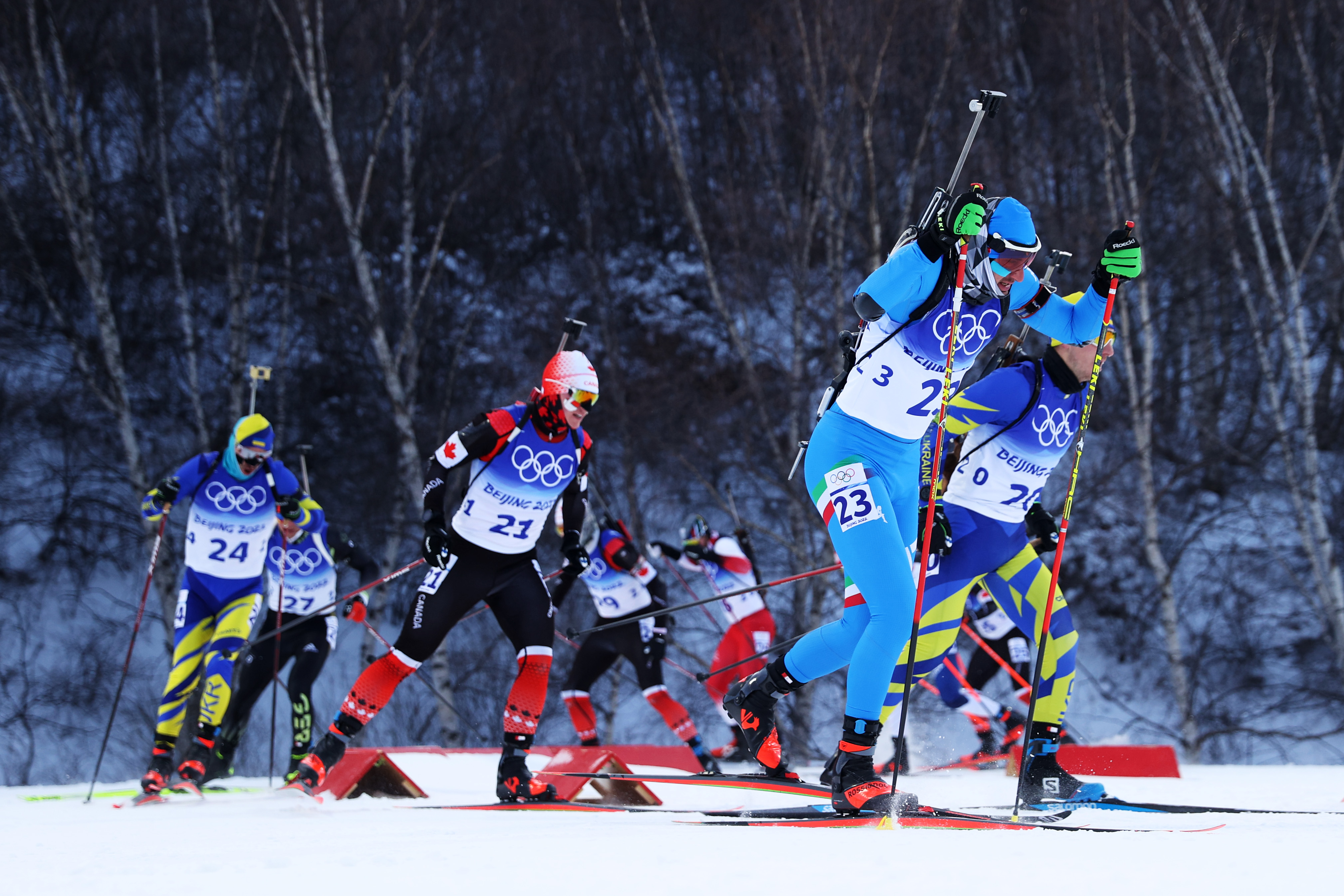 ZHANGJIAKOU, CHINA - FEBRUARY 18: Dominik Windisch of Team Italy skis during Men's Biathlon 15km Mass Start on day 14 of 2022 Beijing Winter Olympics at National Biathlon Centre on February 18, 2022 in Zhangjiakou, China. (Photo by Maddie Meyer/Getty Images)