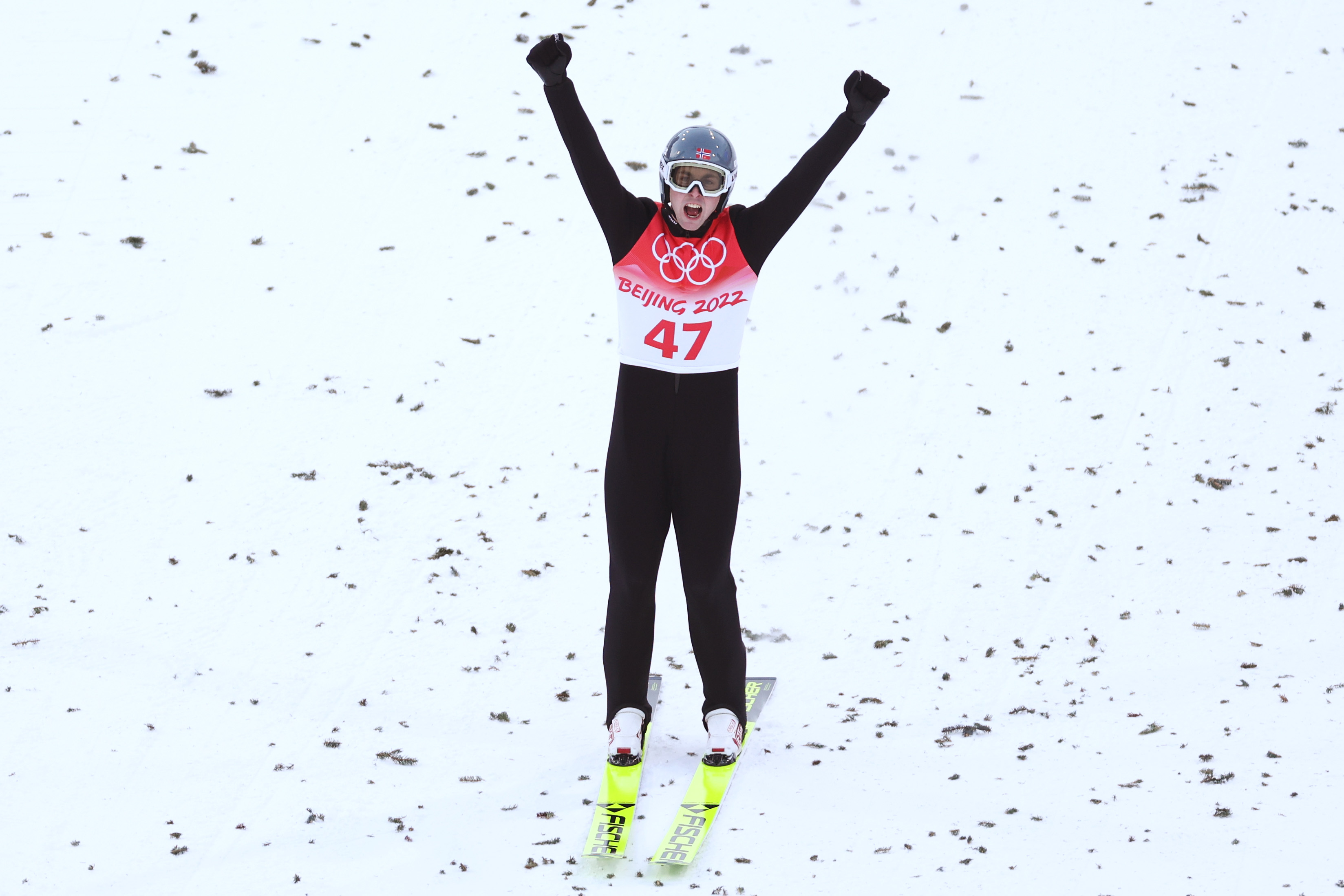 ZHANGJIAKOU, CHINA - FEBRUARY 15: Jarl Magnus Riiber of Team Norway celebrates competes during Individual Gundersen Large Hill/10km, Ski Jumping Competition Round on day 11 of 2022 Beijing Winter Olympics at The National Cross-Country Skiing Centre on February 15, 2022 in Zhangjiakou, China. (Photo by Lars Baron/Getty Images)
