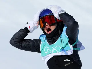 Athlete with hands on head while shouting