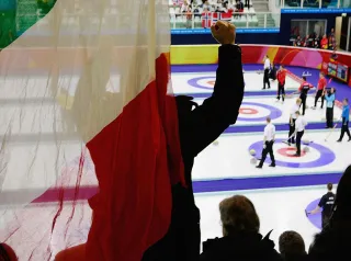 An Italian fan cheers on his team during a match against Finland during a preliminary round of men's curling on Day 9 of the Turin 2006 Winter Olympic Games on February 19, 2006 at Palaghiaccio in Pinerolo near Turin, Italy. Finland won the match 7-4. (Photo by Brian Bahr/Getty Images)