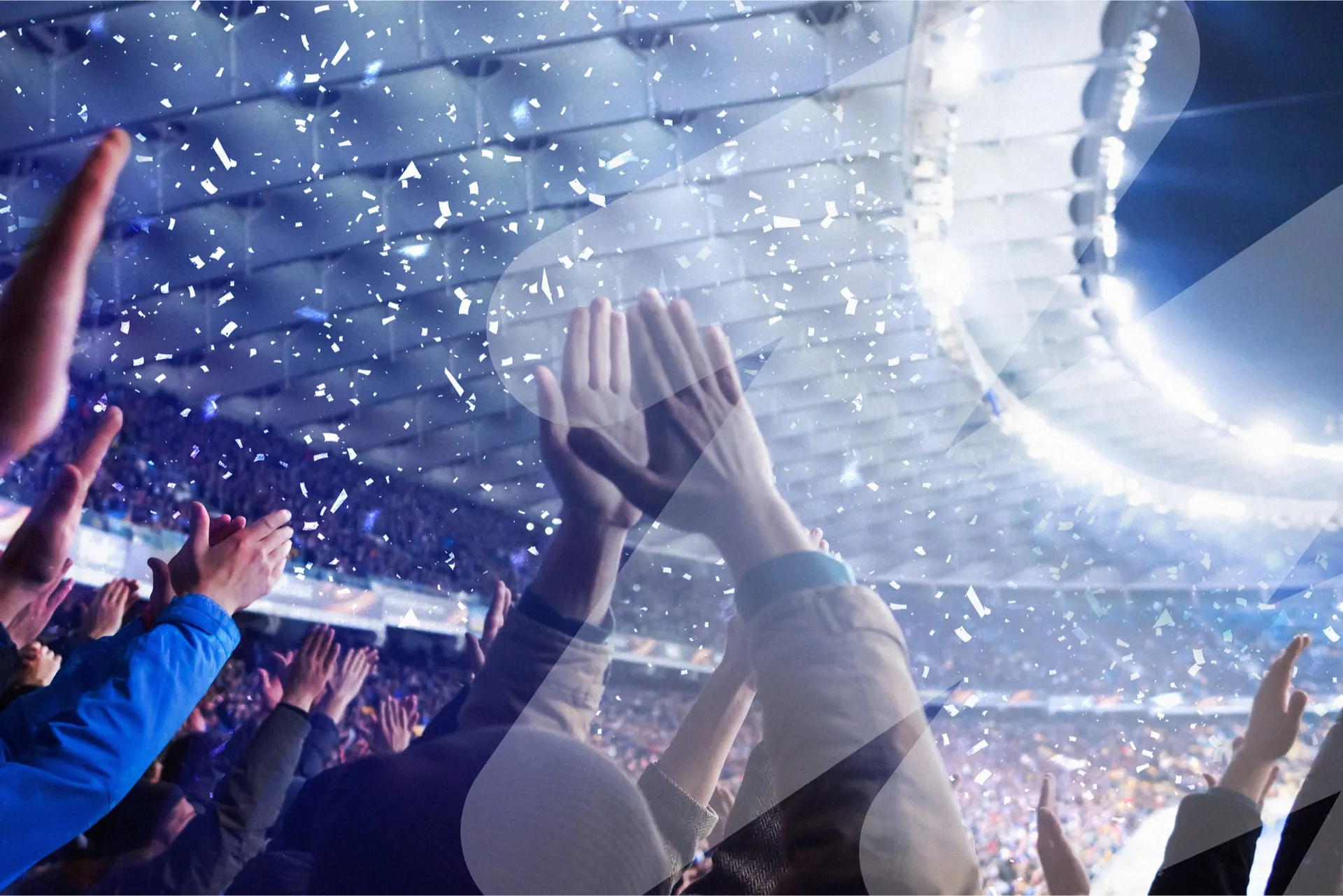 Hands up of people in a stadium